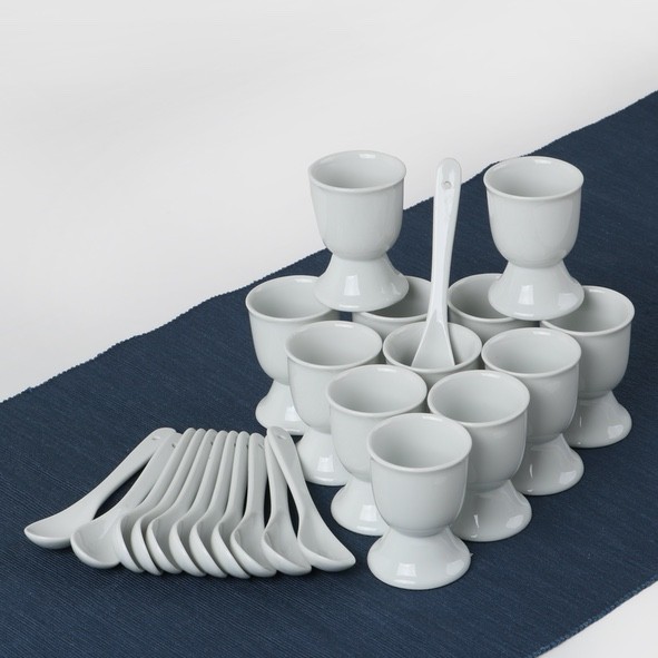 24-piece set of porcelain egg cups with egg spoons